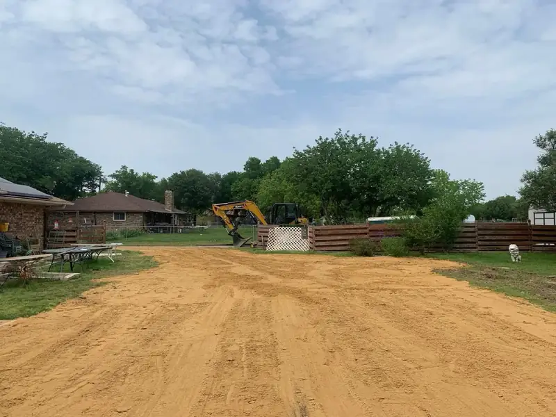 Pool site fully removed, backfilled and graded to a clean sand pad